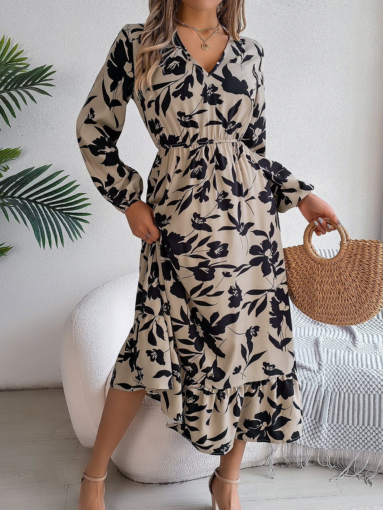 Casual floral print waist cinching long sleeved ruffle edge dress