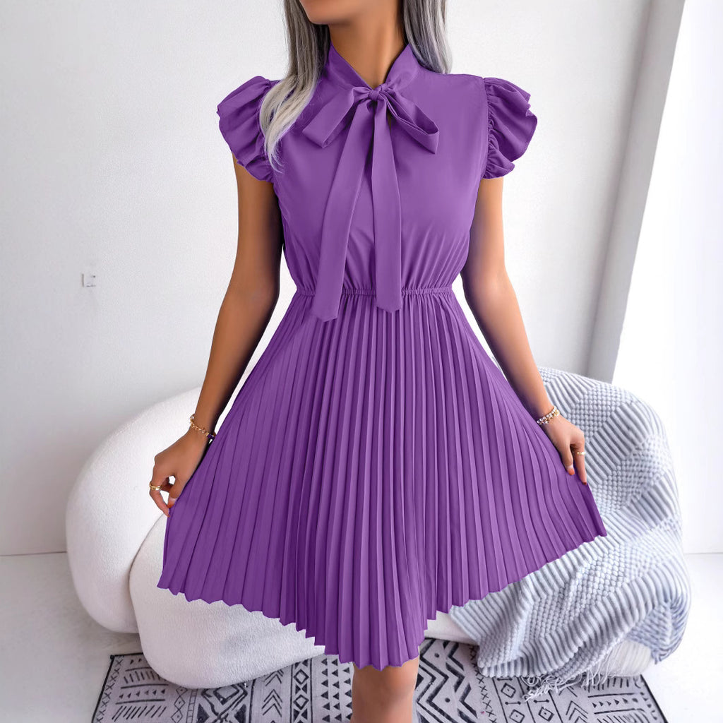 Realistic photo of 2025 European and American spring and summer temperament, tie up waist, big hem pleated skirt