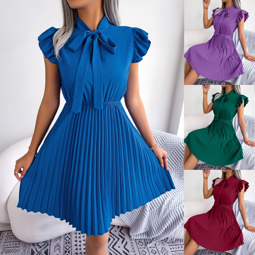 Realistic photo of 2025 European and American spring and summer temperament, tie up waist, big hem pleated skirt