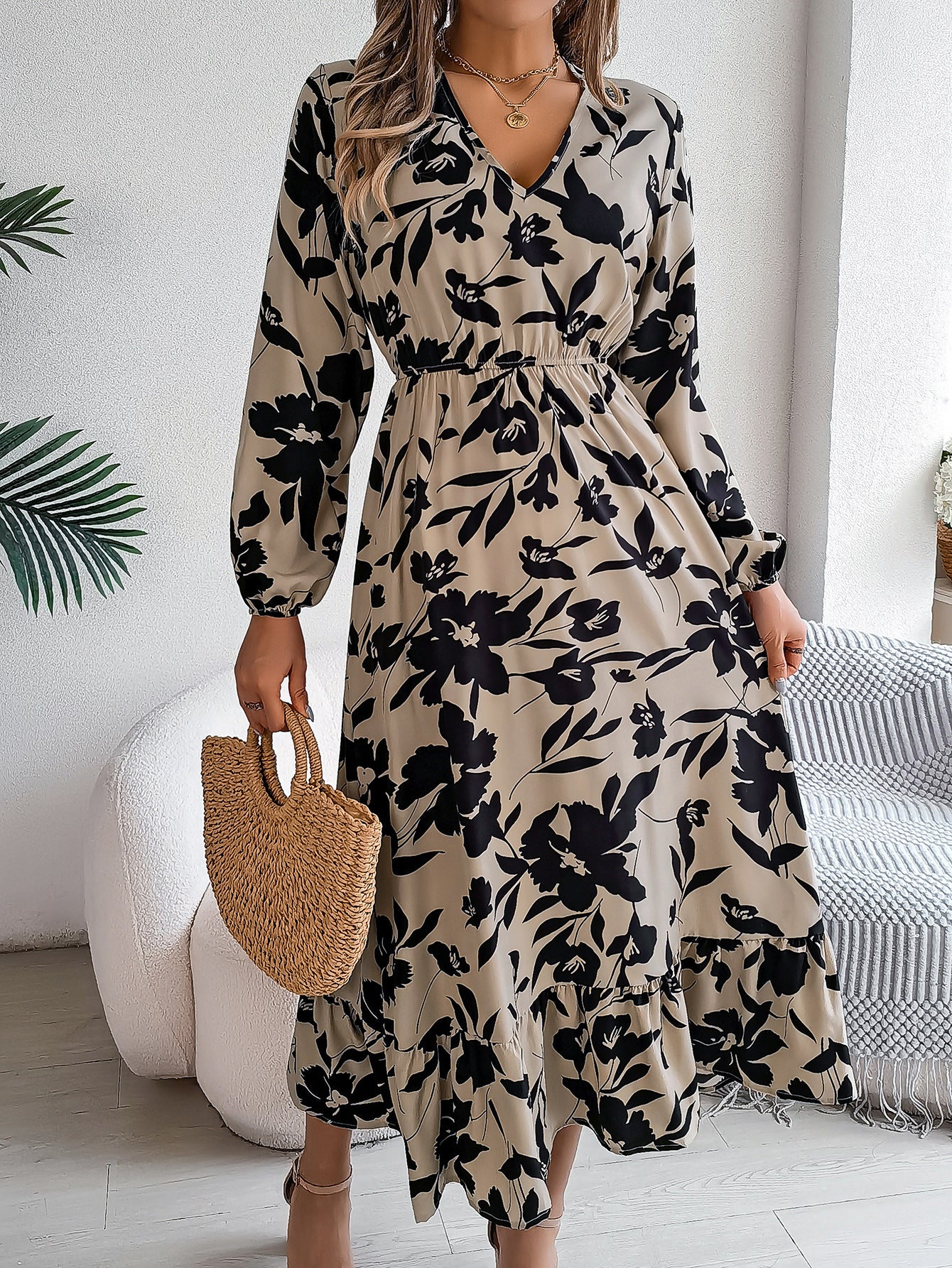 Casual floral print waist cinching long sleeved ruffle edge dress