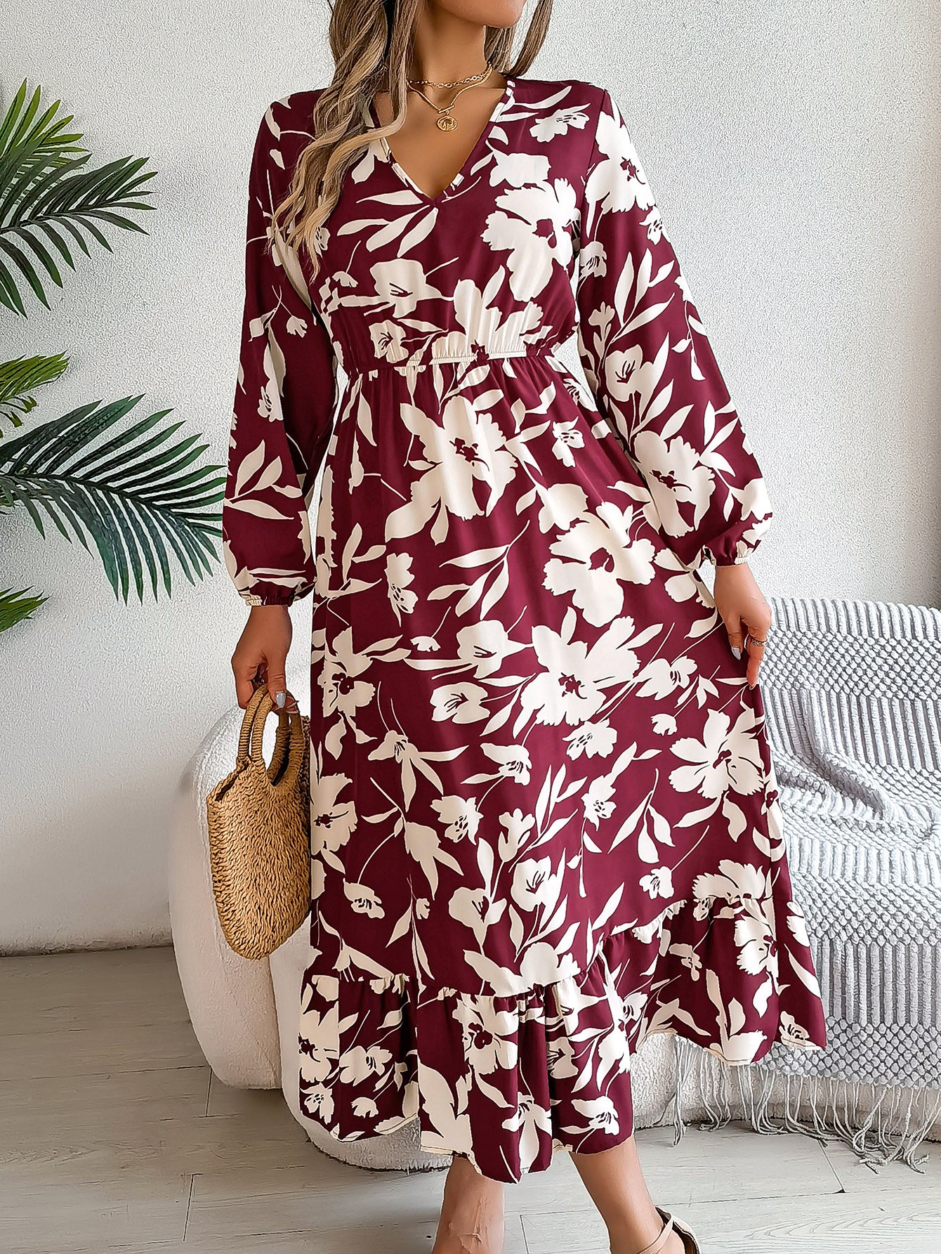 Casual floral print waist cinching long sleeved ruffle edge dress